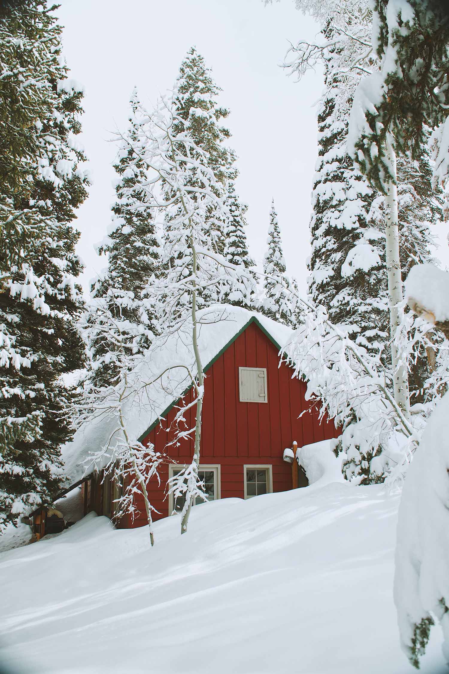 a red house in the snow